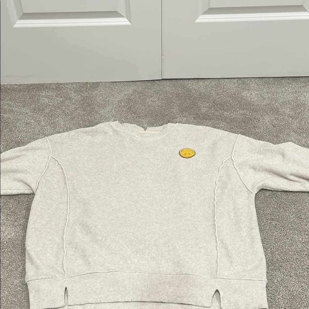 Tan Sweatshirt with Smiley Patch